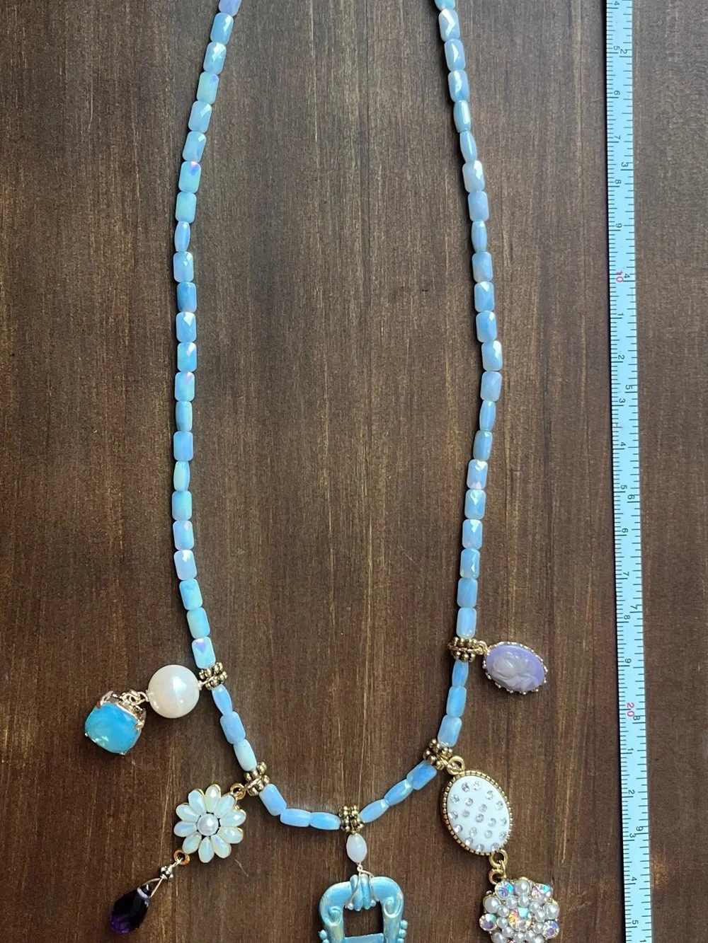 Handcrafted pendant with lavender mother of pearl beads